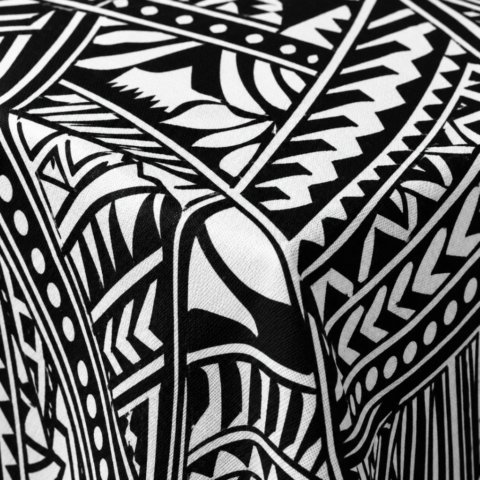 CELEBRATIONS CAYMAN TABLE linens_TABLECLOTH BLACK WHITE TRIBAL ROUND 132inD