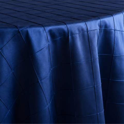 CELEBRATIONS CAYMAN RENTAL TABLE LINENS_TABLECLOTH NAVY BLUE PINTUCK ROUND 132inD_TABLECLOTH BLACK GLAMOUR SEQUIN ROUND 132inD