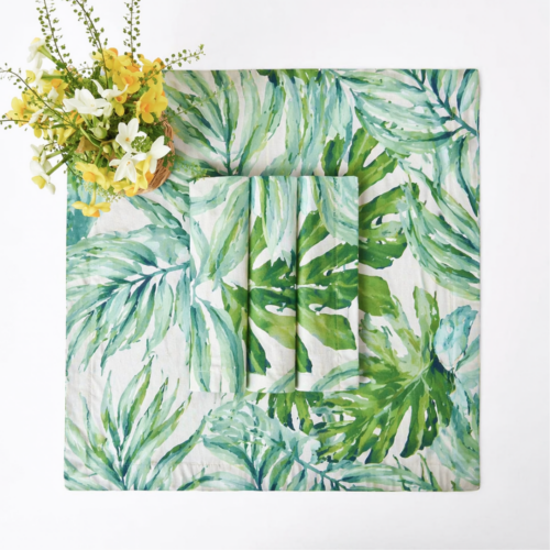 NAPKIN GREEN TROPICAL PRINT POLY 20IN X 20IN